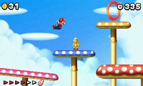 Raccoon Mario flies while Koopa Troopa dances in New Super Mario Bros. 2