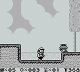 Screenshot. A goomba approaches.