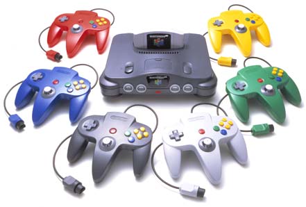 Nintendo 64 surrounded by its coloured controllers.