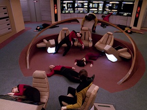 Screenshot: The bridge crew are rendered unconcious before Data's very visual processors.
