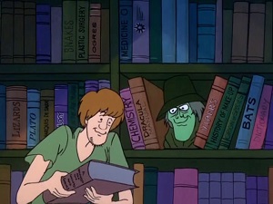 Screenshot: Mr. Hyde lurks behind a bookshelf.