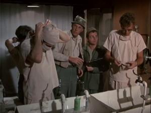 Image. Hawkeye and Trapper scrub for surgery.