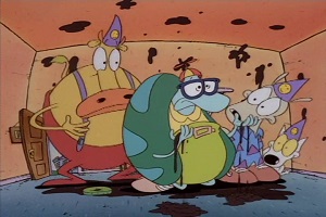 Filburt savagely tears his birthday cake asunder.