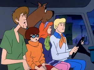 Shaggy, Velma, Scooby, Daphne, and Fred in the Mystery Machine.