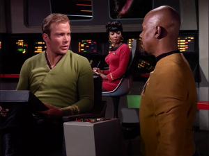 Image. Sisko goes back in time to deliver a report to Captain Kirk.