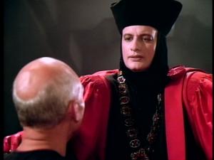 Q sits in judgement over humanity.