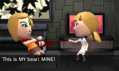 Miko and Penny pulling a teddy bear remarkably asunder.