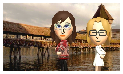 Mickey and Abby standing outside the Kapellbrucke in Luzern.