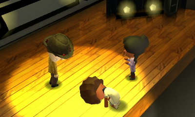 Kodey celebrates while Gracie grieves, onstage after a little a capella ditty by Kodey.