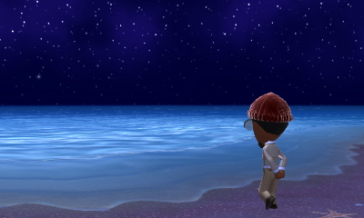 Max staring off into the horizon at the beach.