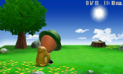 Steve Harvey sitting sadly on a sunny hillside in his raincoat and hat.